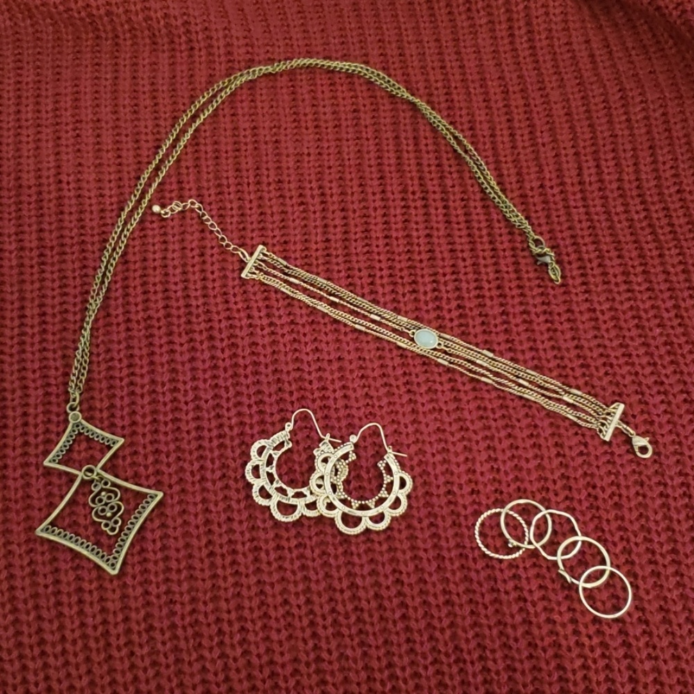 Neclace, earrings, bracelet, and stackable rings